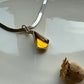Amber herringbone pendant necklace