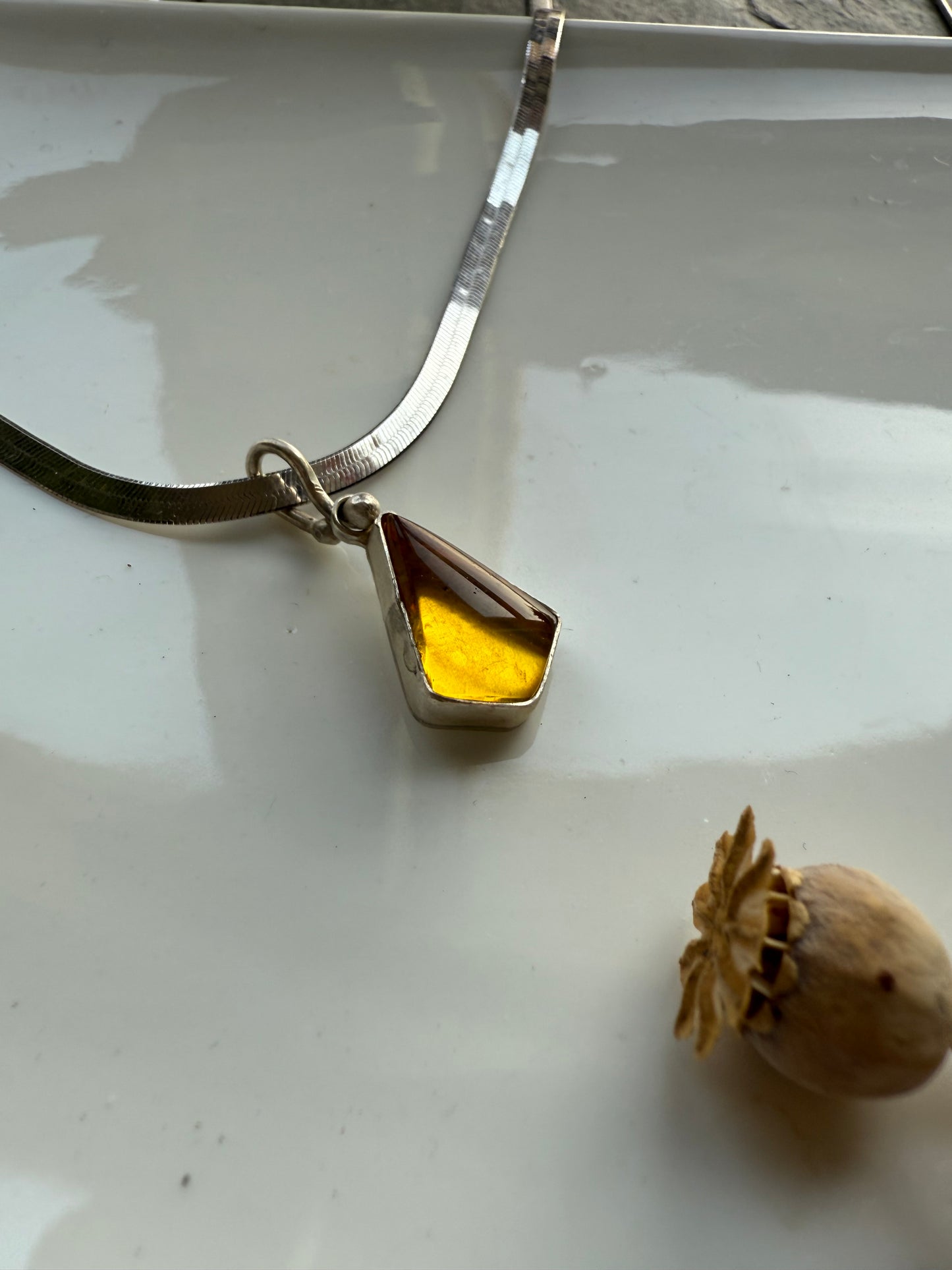 Amber herringbone pendant necklace