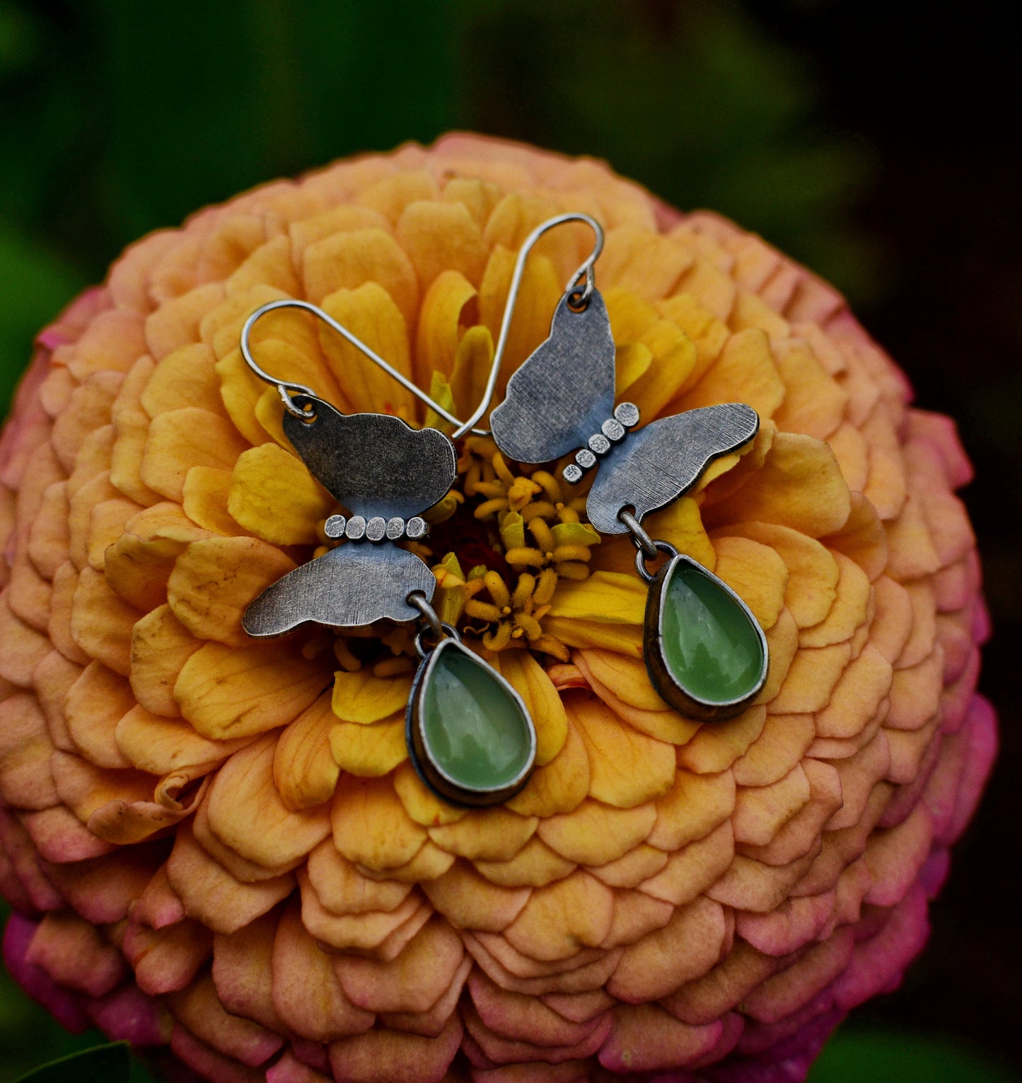 Butterfly earrings, sterling silver and peridot